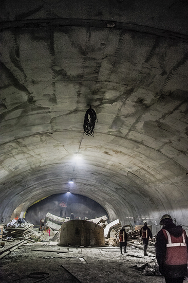 Workers clear # 7 Line completed tunnel of pre- manufactured segments. 
#0672.jpg  ©clayton price : Underground New York : Clayton Price Photographer